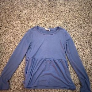 Long sleeve ruffle bottom shirt